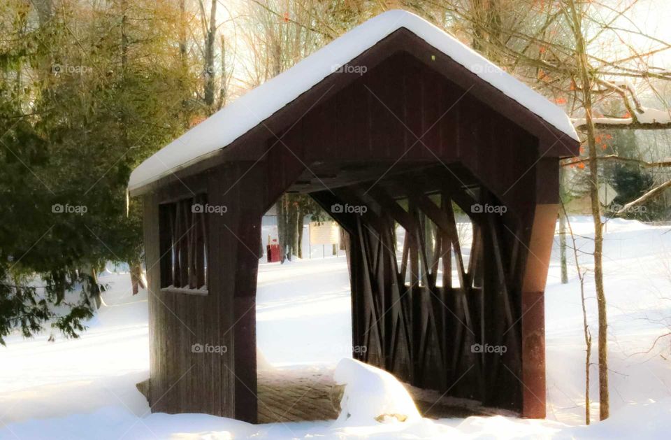 Snow covered prayer at bridge