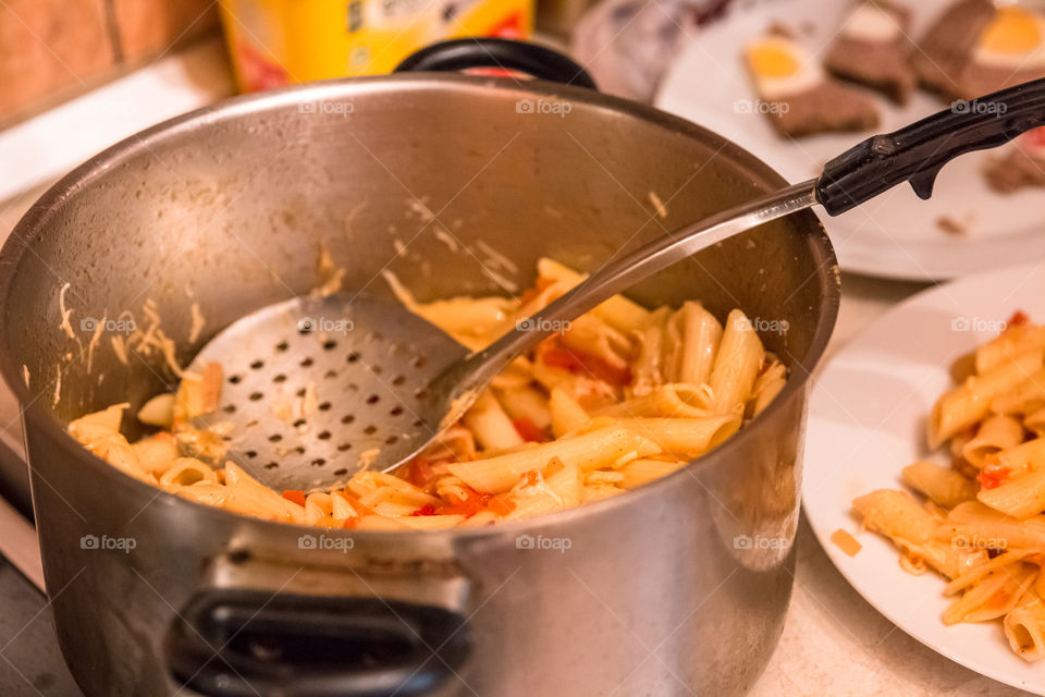 Close-up of cooking pasta