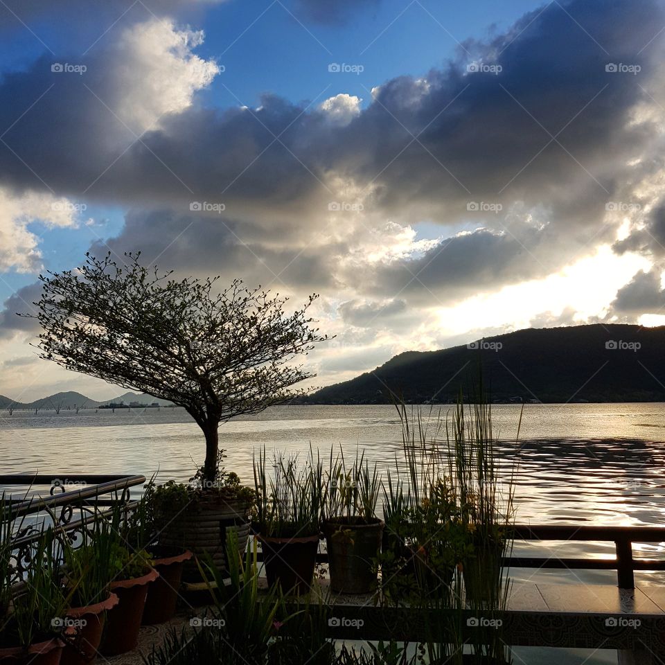 Scenic view of lake against blue sky