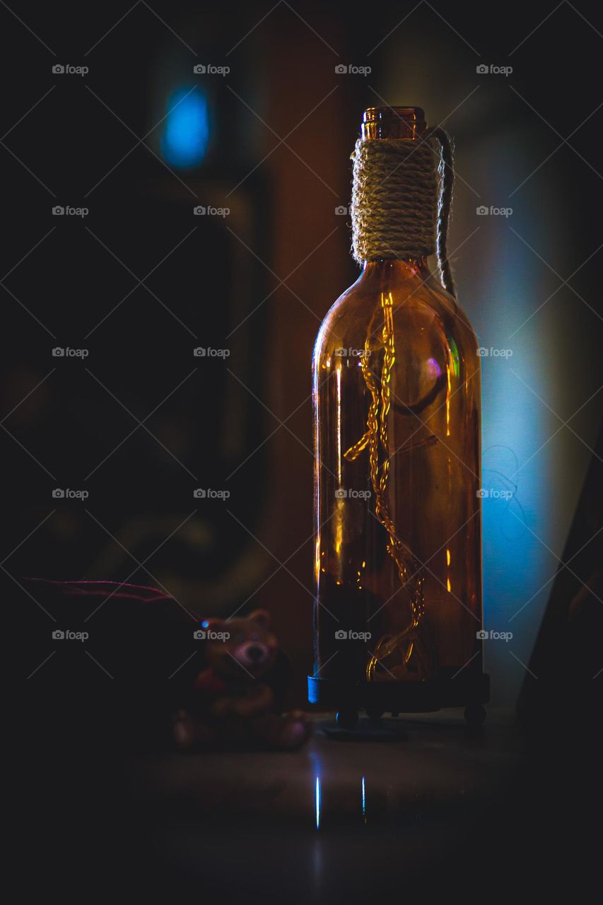 Rustic bottle full of lights.