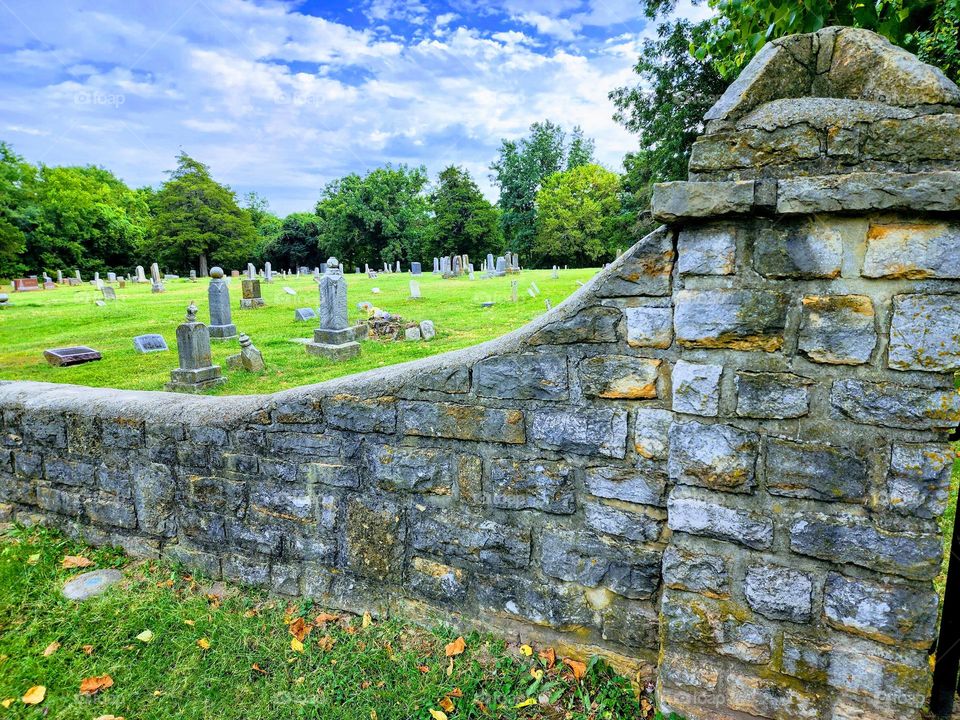 An old cemetery hosts many souls dating back to the mid-1800's and is surrounded by a beautiful hand laid stone wall constructed numerous decades ago