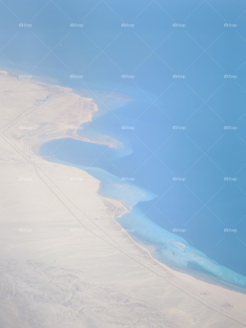 Sea from the window of the plane