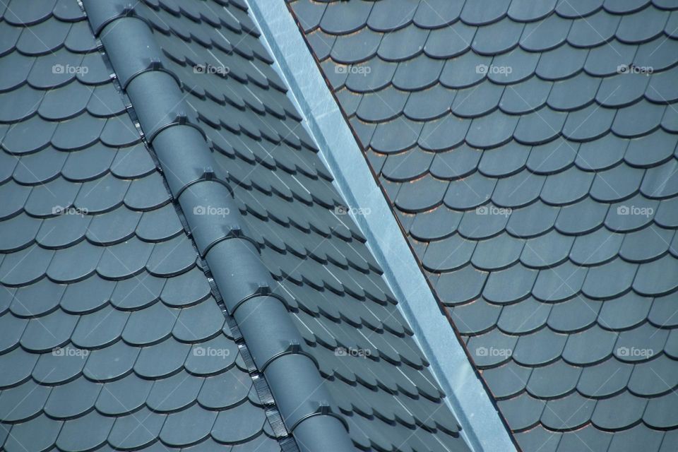 Close-up of a roof with gray roof tiles