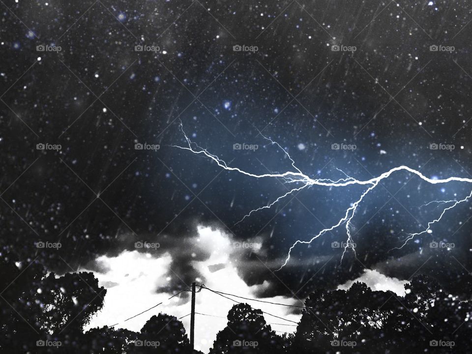 Bold lightning strike on a rainy night.