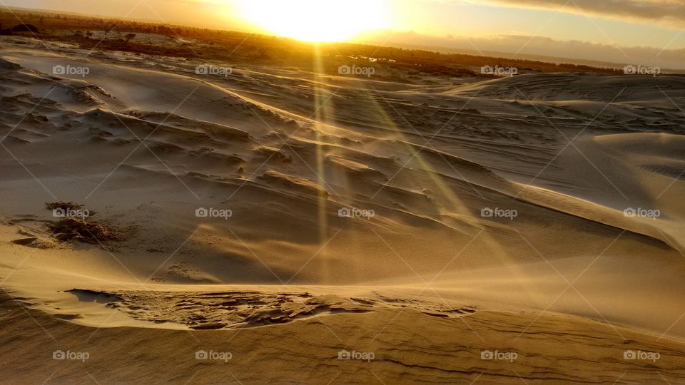 por do sol fim de tarde no as dunas de areia