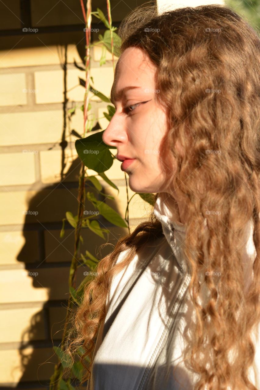 young girl beautiful portrait in sunlight