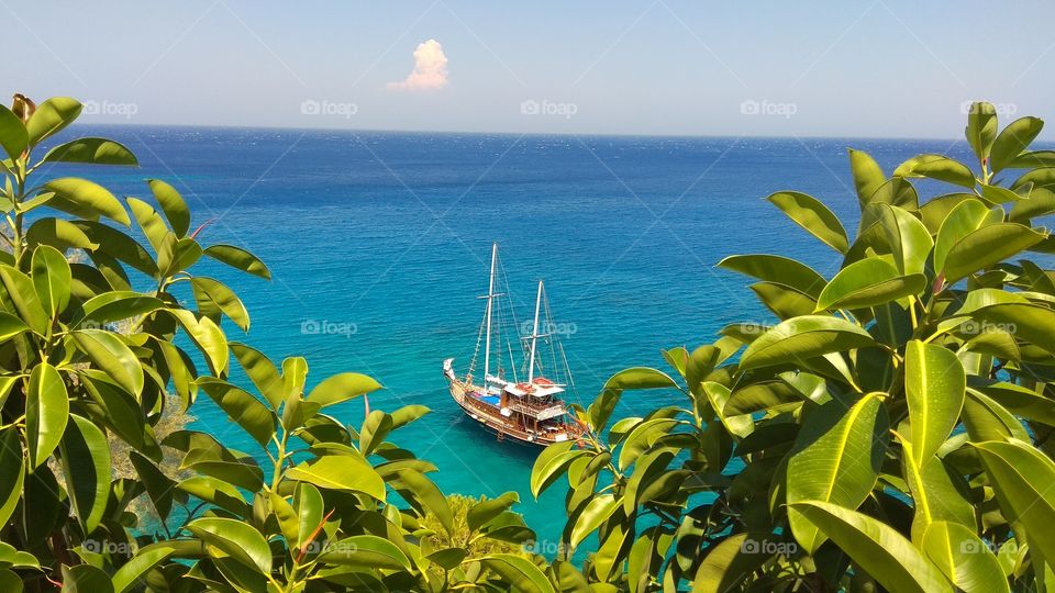 Hop on Hop off beaches boat seen from Kyra Panagia Beach, Greece (Karpathos Island)