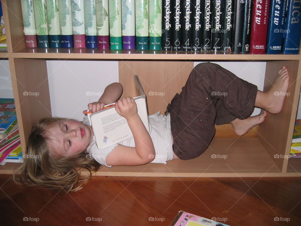 Girl in the bookshelf