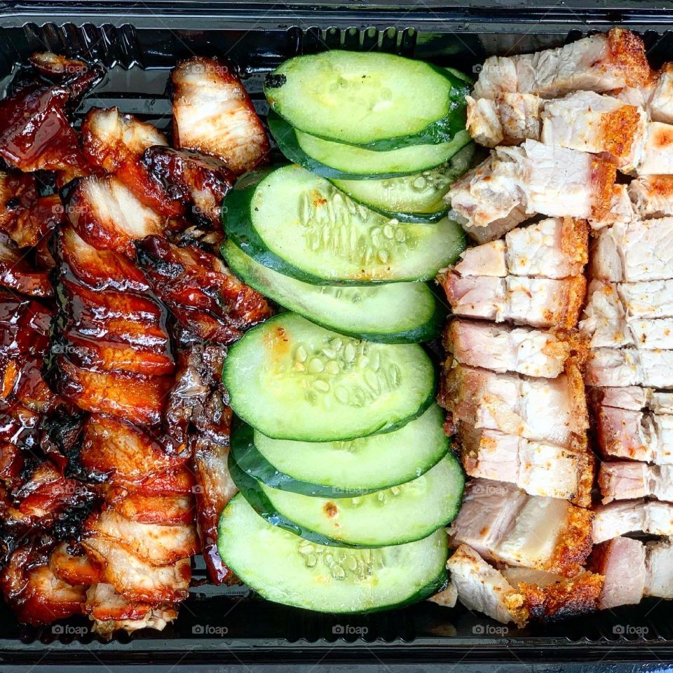 Dang gui duck, roasted pork belly, char siew, century egg dumpling and vegetables 