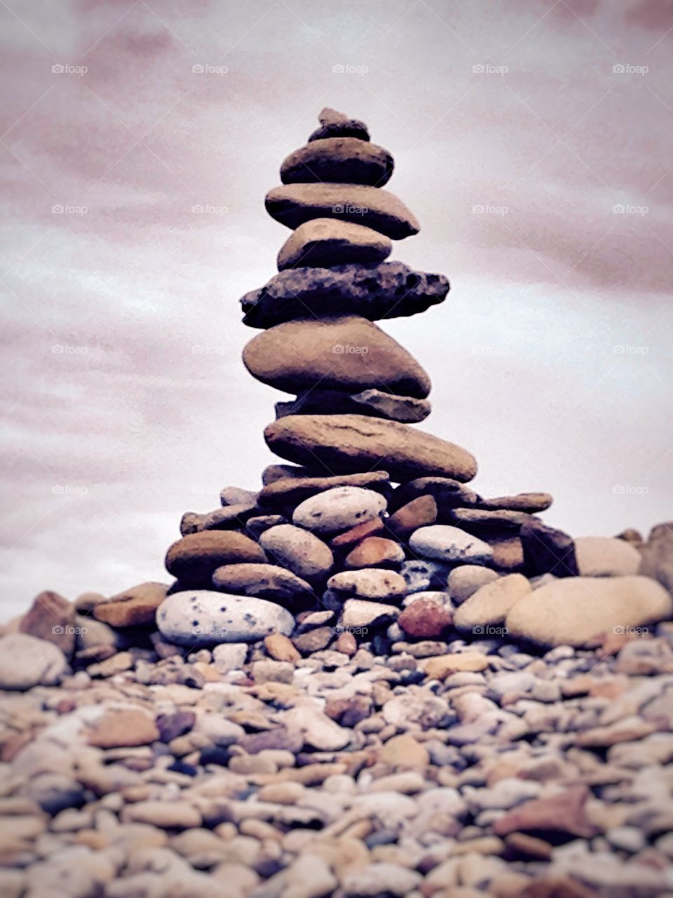 Stacked stones. Beach stones piled high
