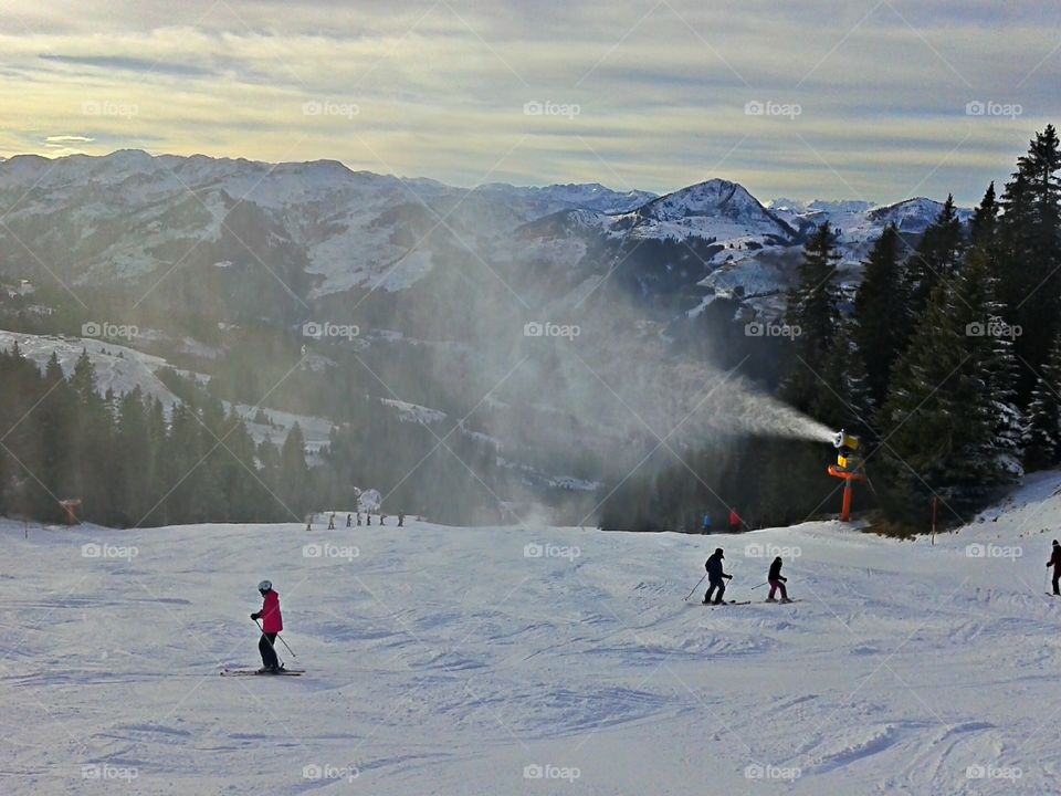 Morning downhill skiing. Morning skiing in Austria