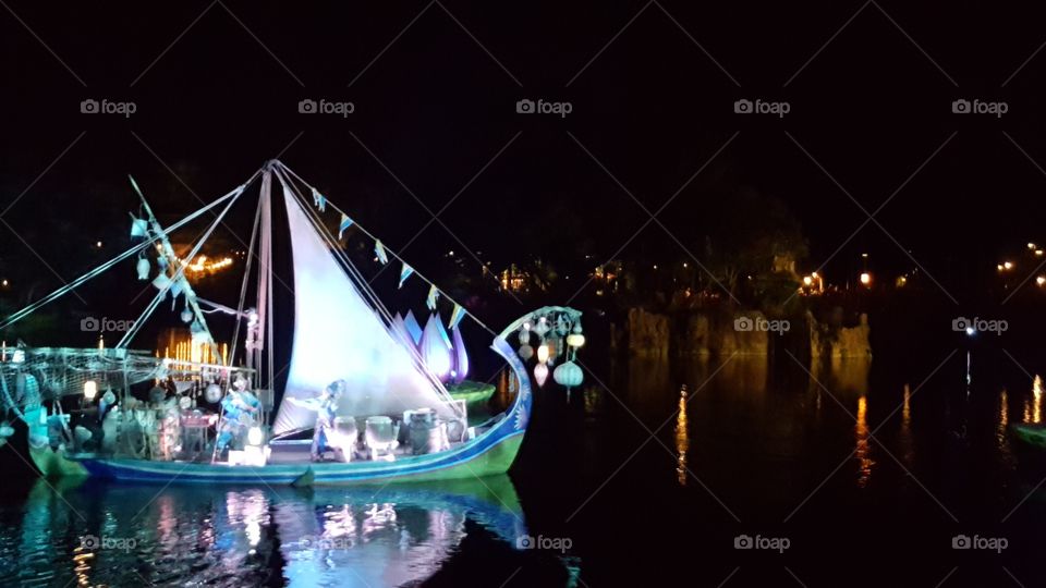 A mystical ship sails into Discovery River during Rivers of Light at Animal Kingdom at the Walt Disney World Resort in Orlando, Florida.