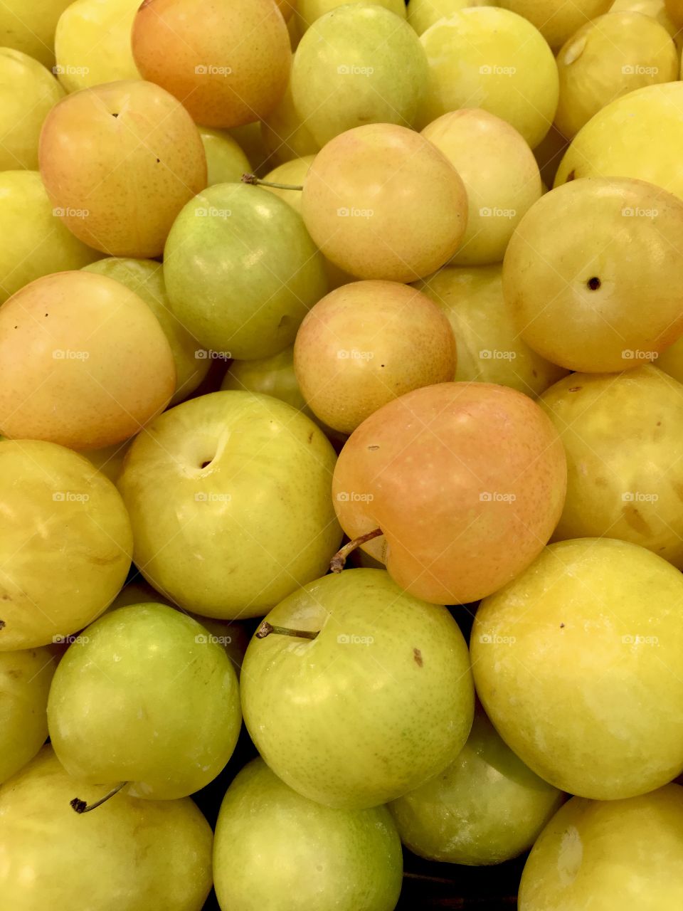 Yellow plums close up photo, fresh juicy yellow plums photo for displaying 