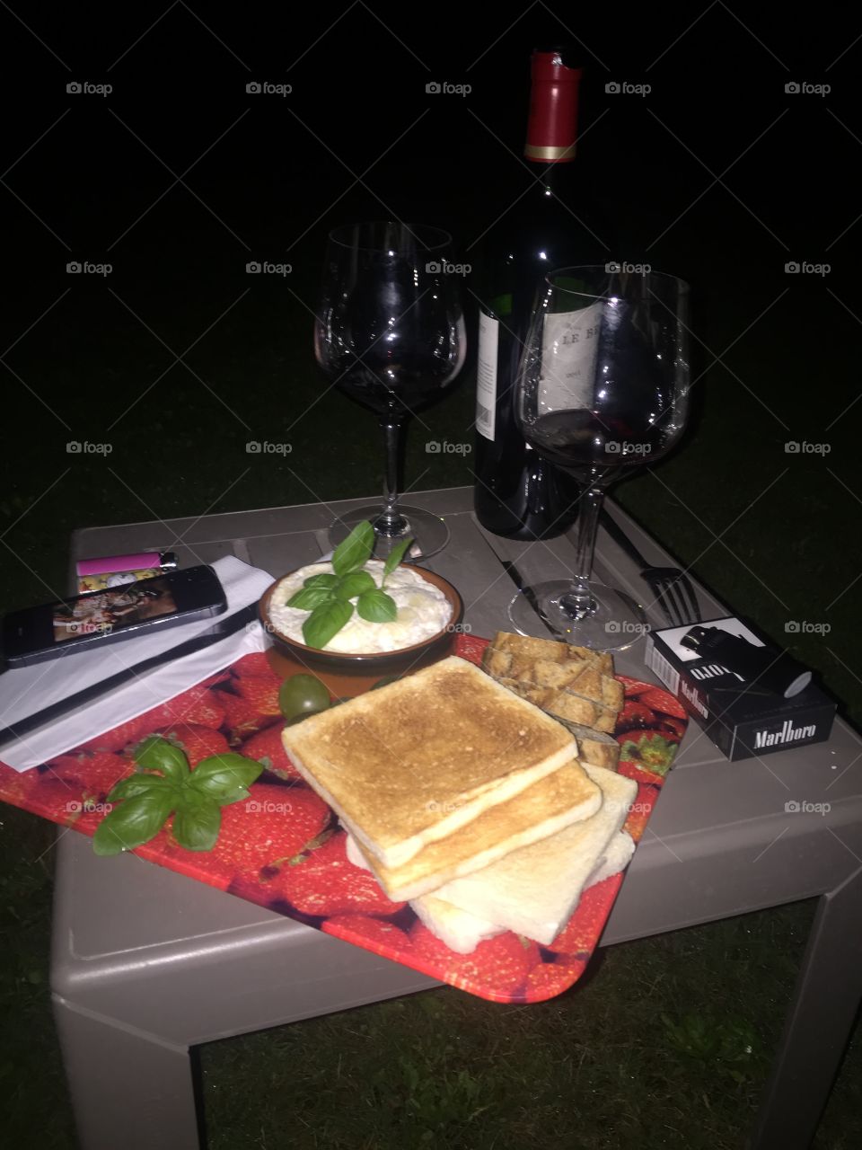 Dinner in the garden . Dinner in the garden at night 