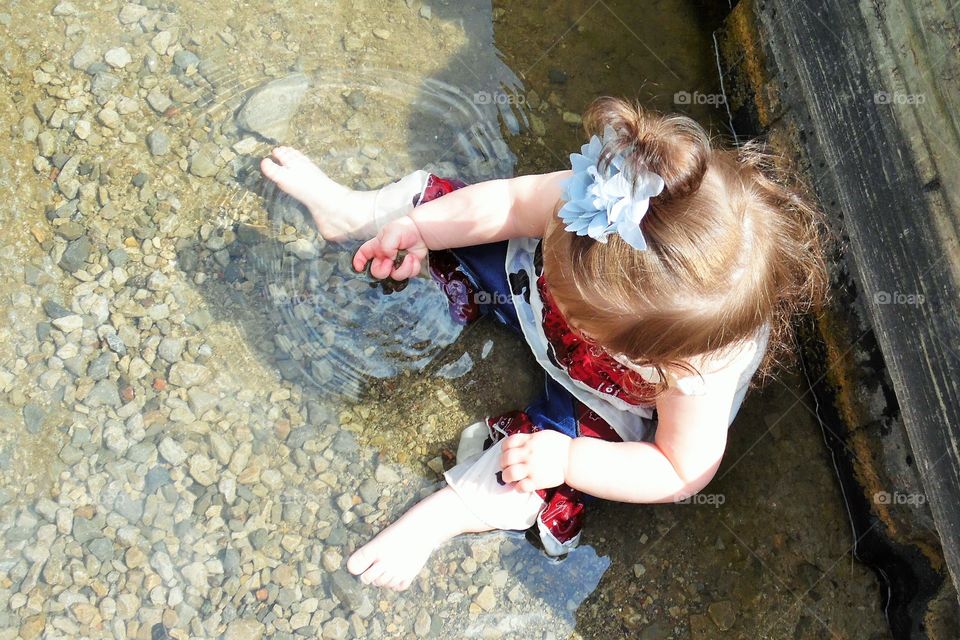 Couldn't resist. Was taking pics of my grandaughter at the lake. She sat down fully clothed.