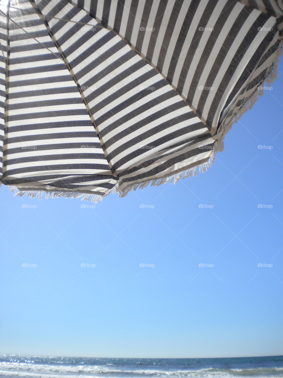 sky and beach umbrella