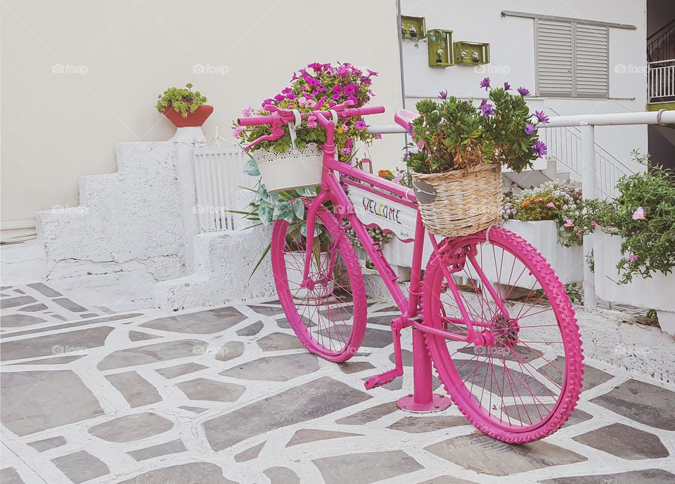 Lonely pink bicycle