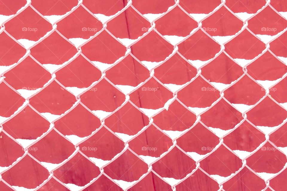 snow on mesh makes 3d effect against reddish background