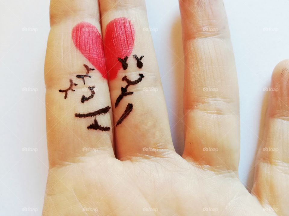 Fingers drawn representing two lovers