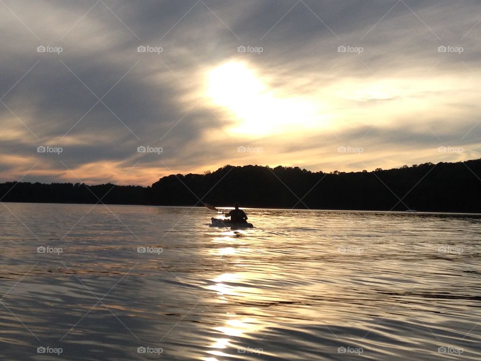 Following the setting sun. Fair Play, SC.  Kayaking on the lake
