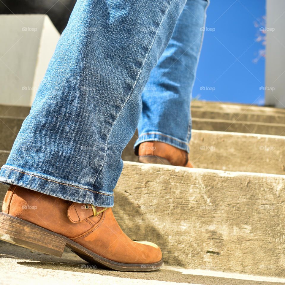 Man woman walking up the stairs 