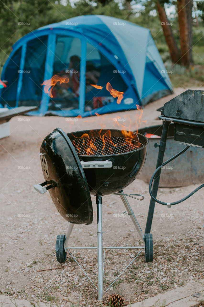 Grilling at a campsite 