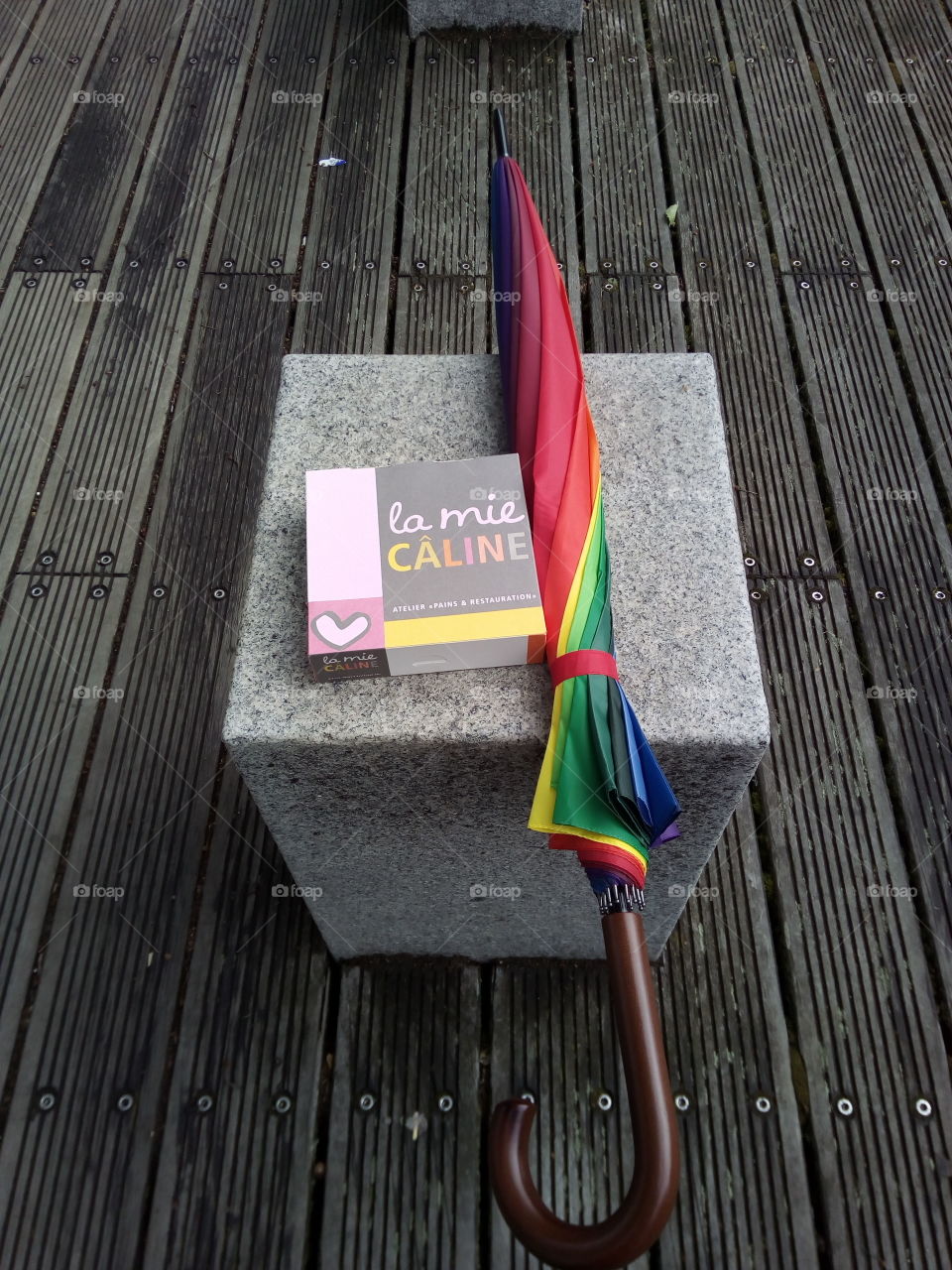 Umbrella from the rain and eclairs