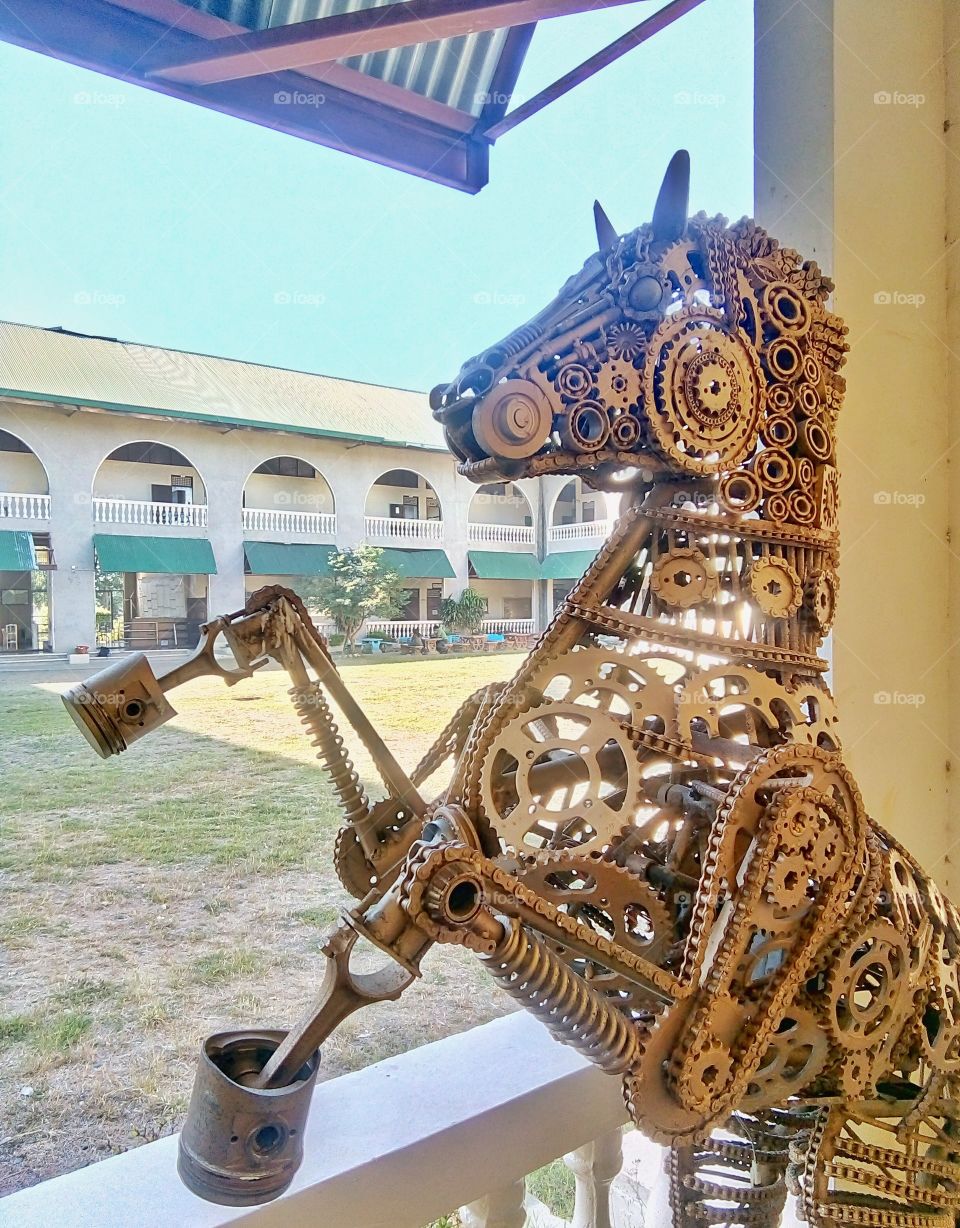 Mechanical horse made by students from scrap gears, shocks, screws, pistons every mechanical related parts you name it!