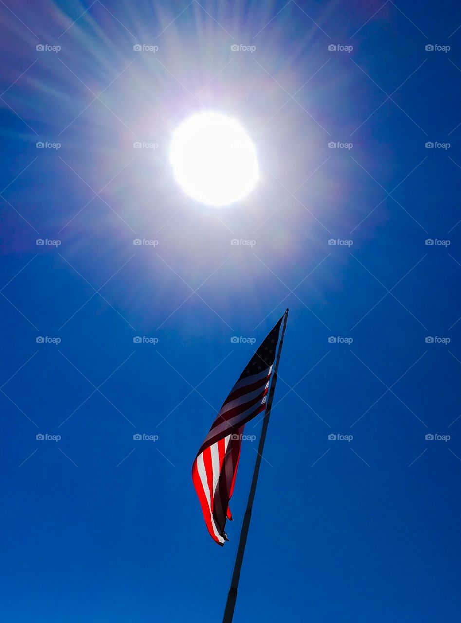 Sun with flag