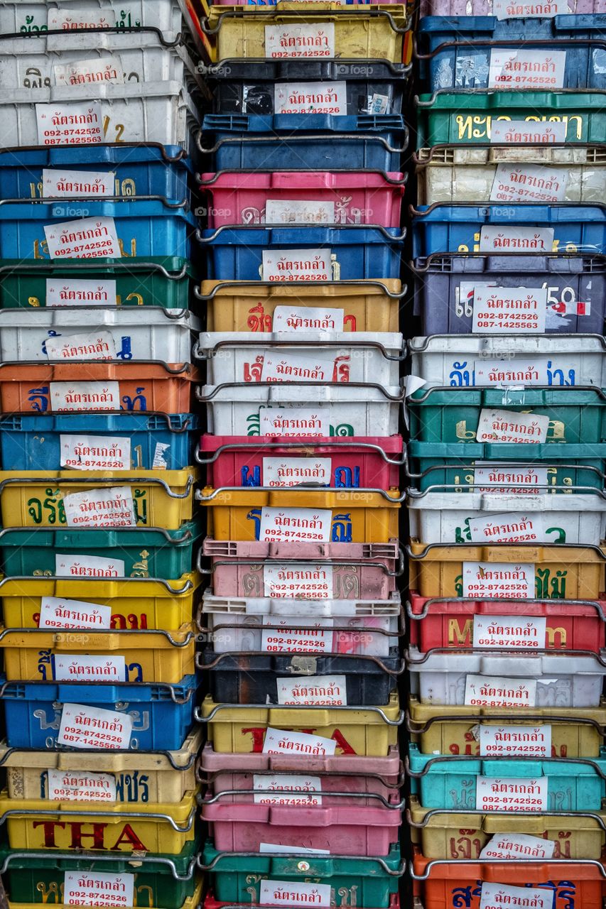 Colorful Fruit crate stack in market at Bangkok