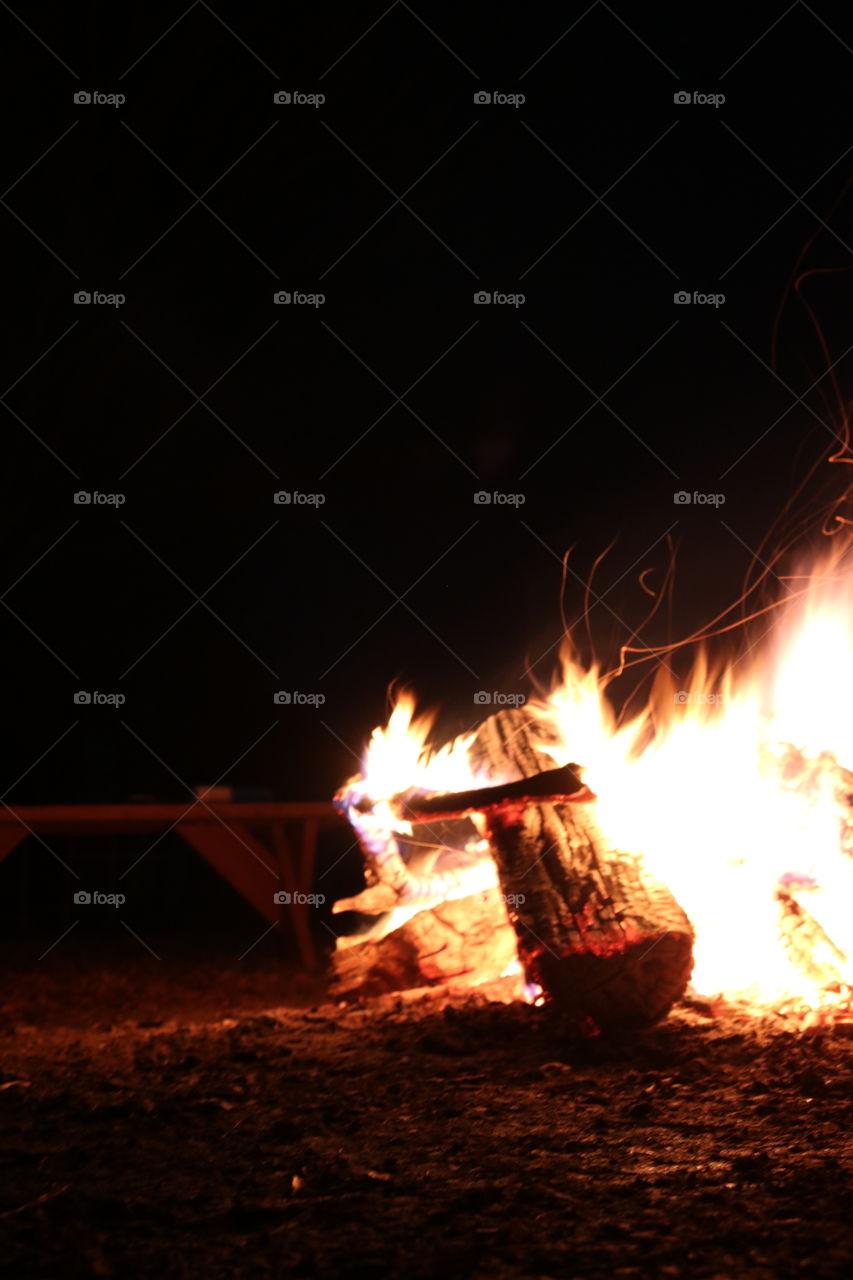 Roasting fire light blazing in the night