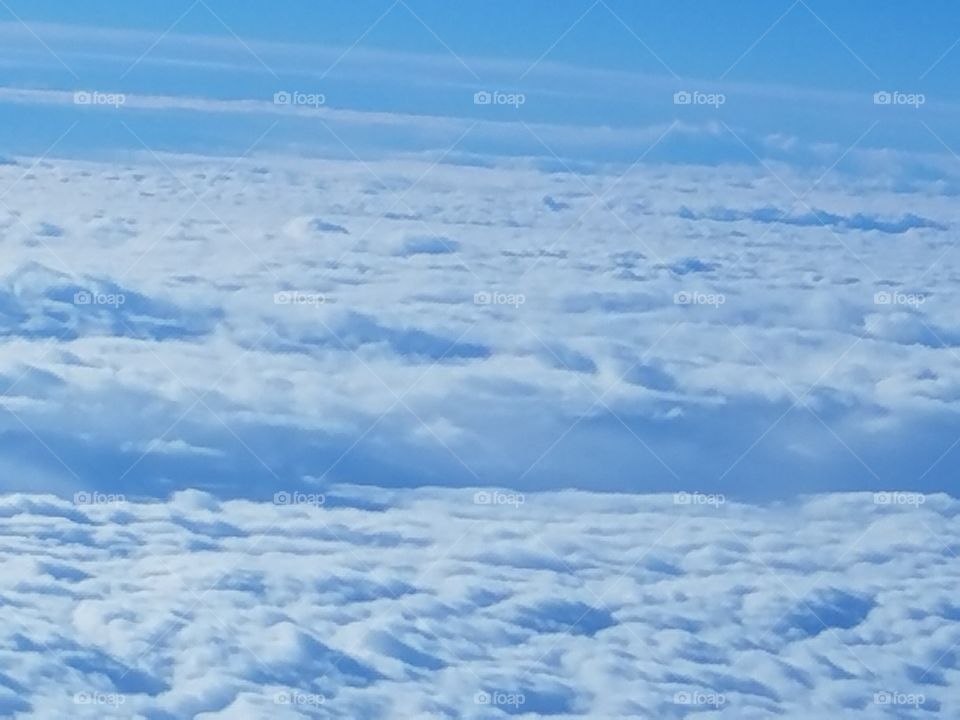 cloud 9. taken in the plane going for a vacation