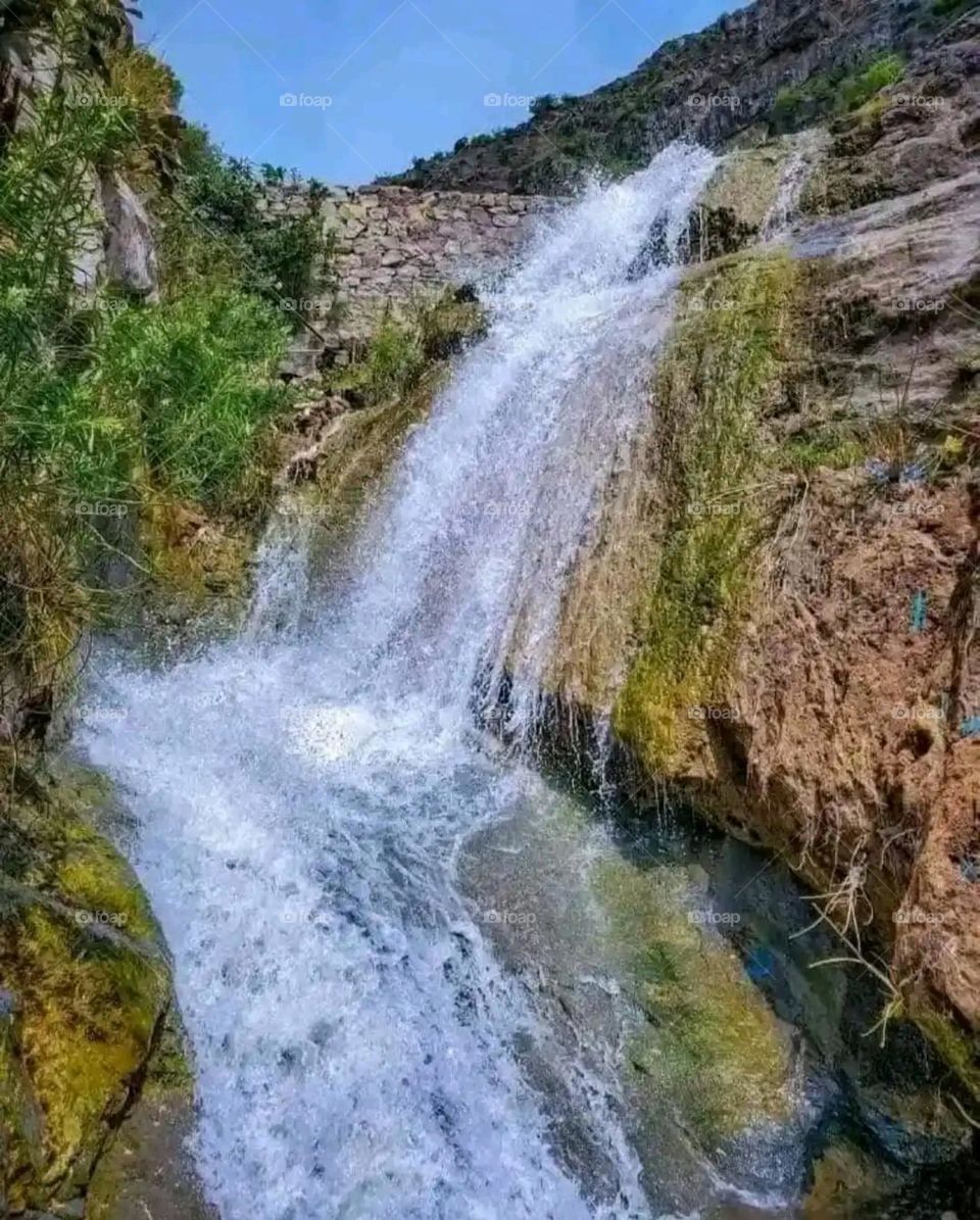 Glory be to God, the magnificent and picturesque view and the natural green trees are a view that is nothing more wonderful than it