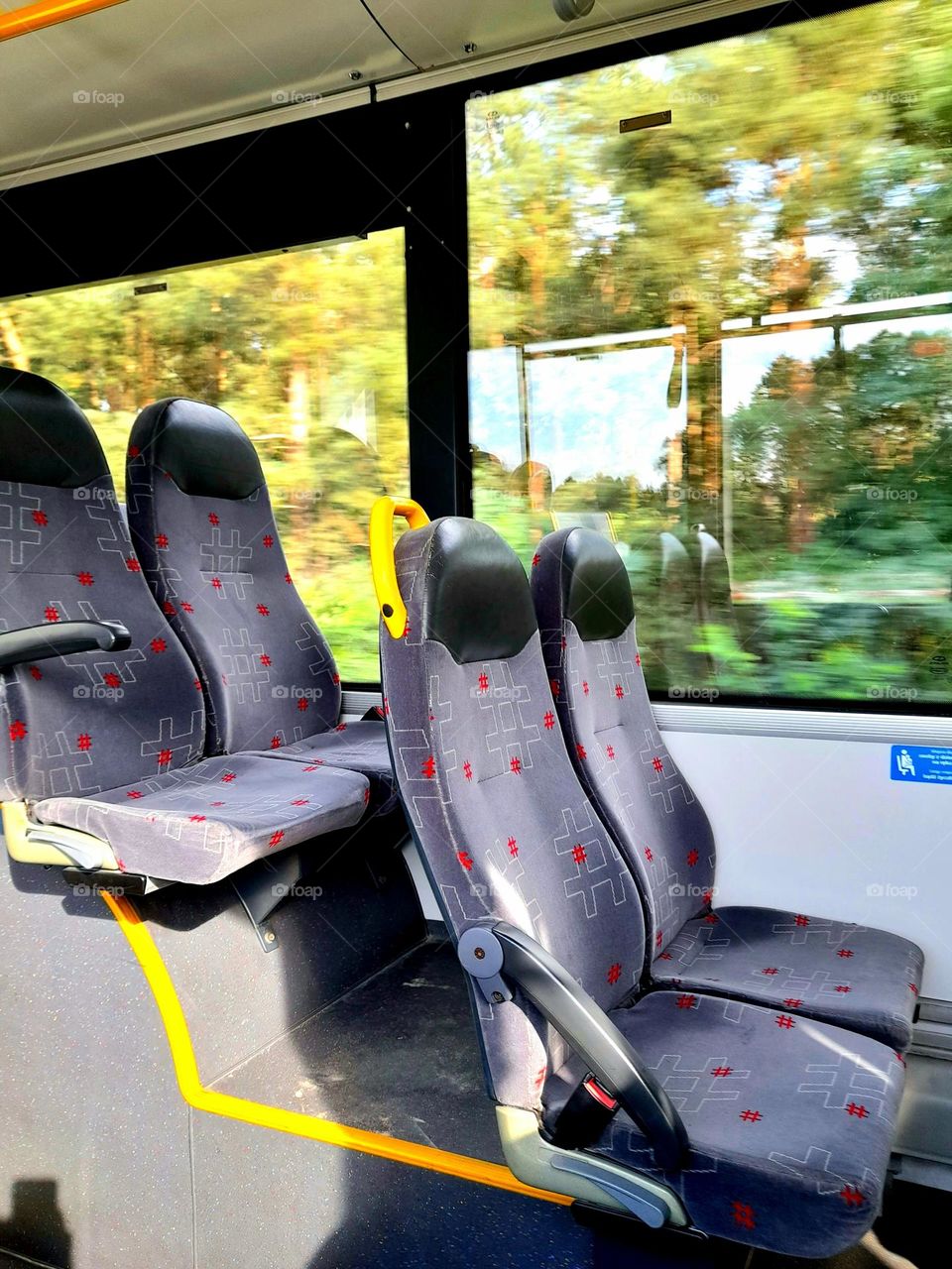 Bus seats with hashtag pattern.
