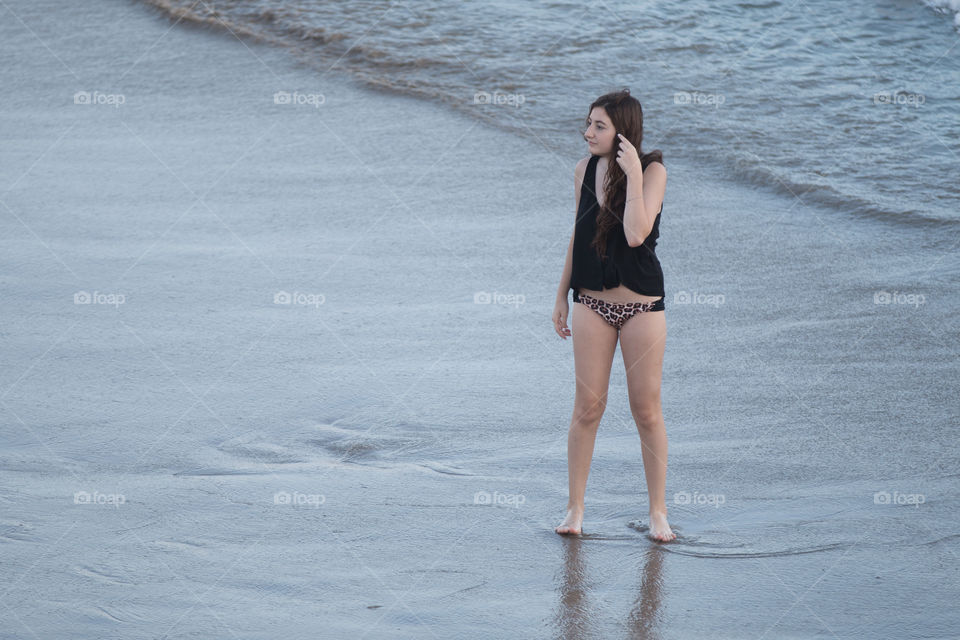 Tourist girl at beach