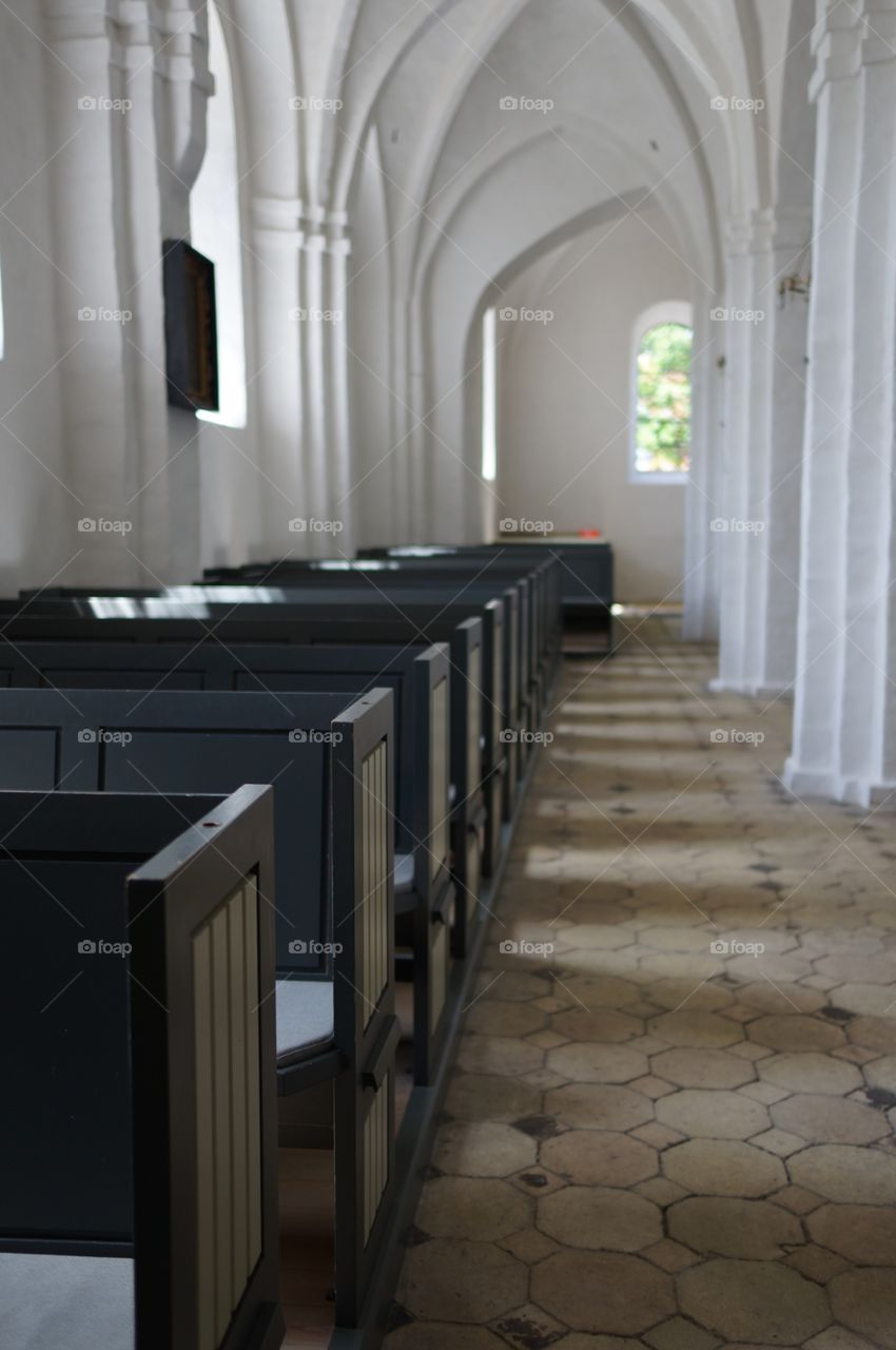 Row of benches in church 