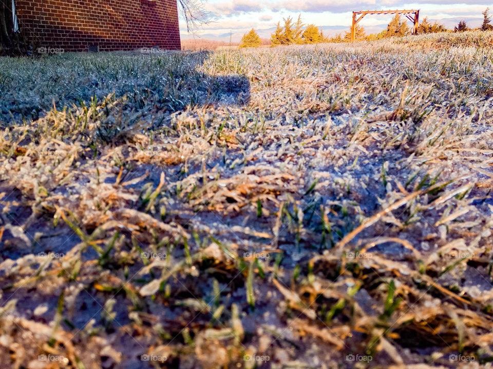 Field of ice with scenic mountains in the background