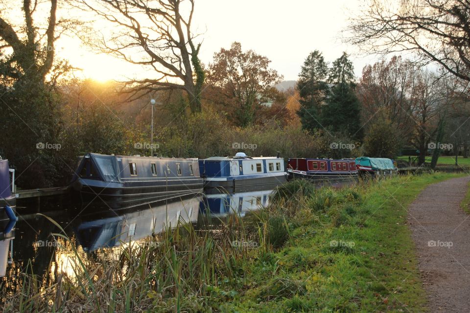 canal barges captured in virtually the last light of the day