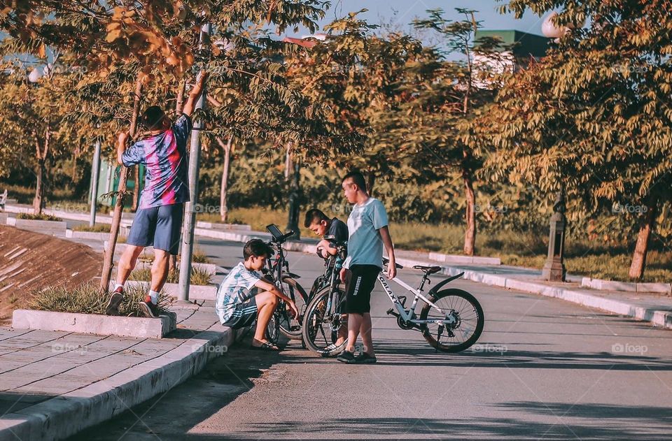 Children with bicycles every afternoon. 