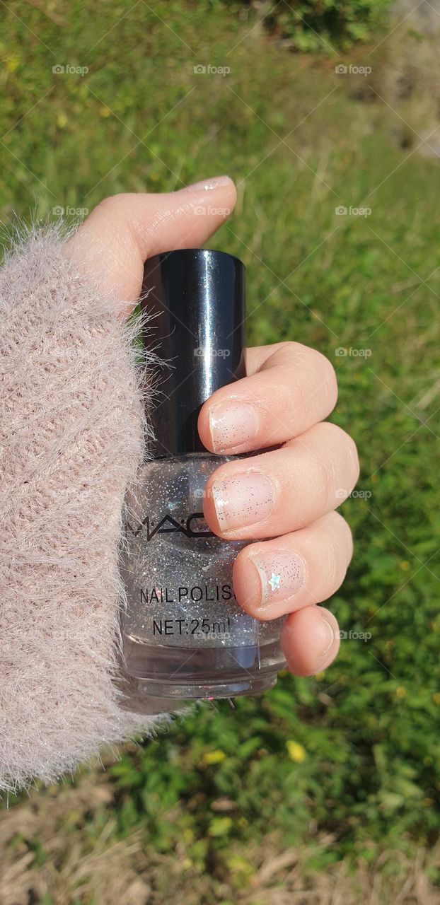 maintenance of your nails, with specific care, with a beautiful shine that highlights the beauty of your hands.  glitter nail polish