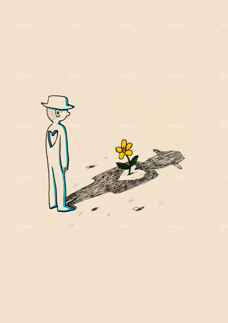 Mann wächst Blume durch sein Herz am Boden im Schatten