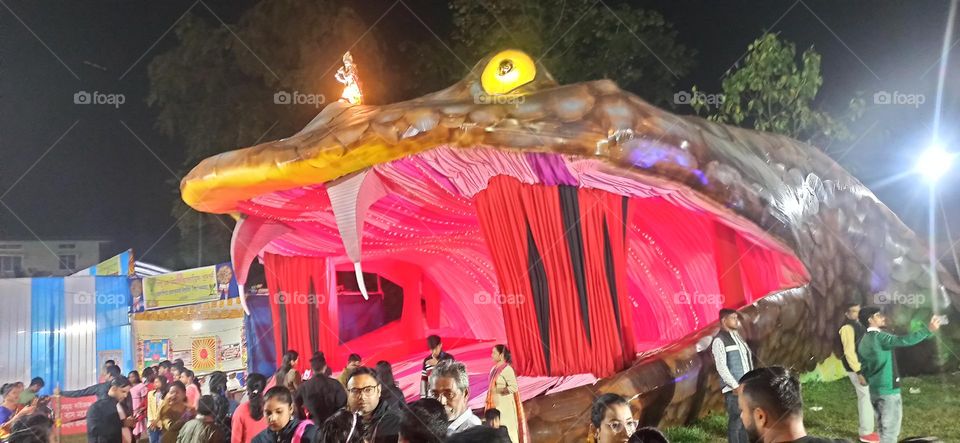 Snake mouth in a big fair