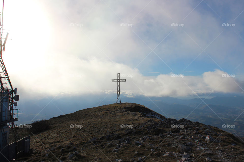 peak with christian cross