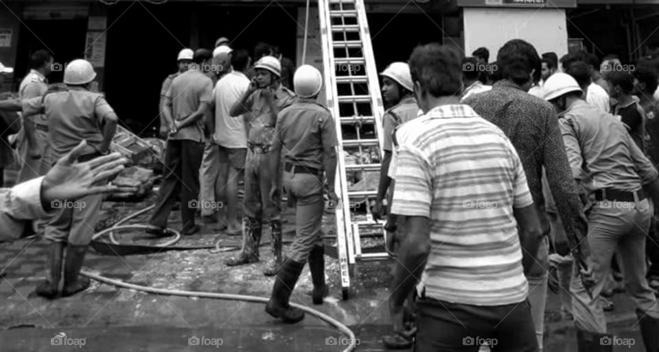 Fire Fighters on Duty. Black & White Photo captured.