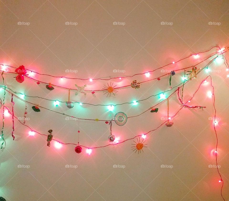 Home made Diwali Decor with DIY ideas of rapper doll+ fake sweets+ Rangoli designs + Chakkari made out of sticks+ hanging bomb balls and sparkly paper. Added more happiness when decor/sweets are made at home, feeling of fulfillment.