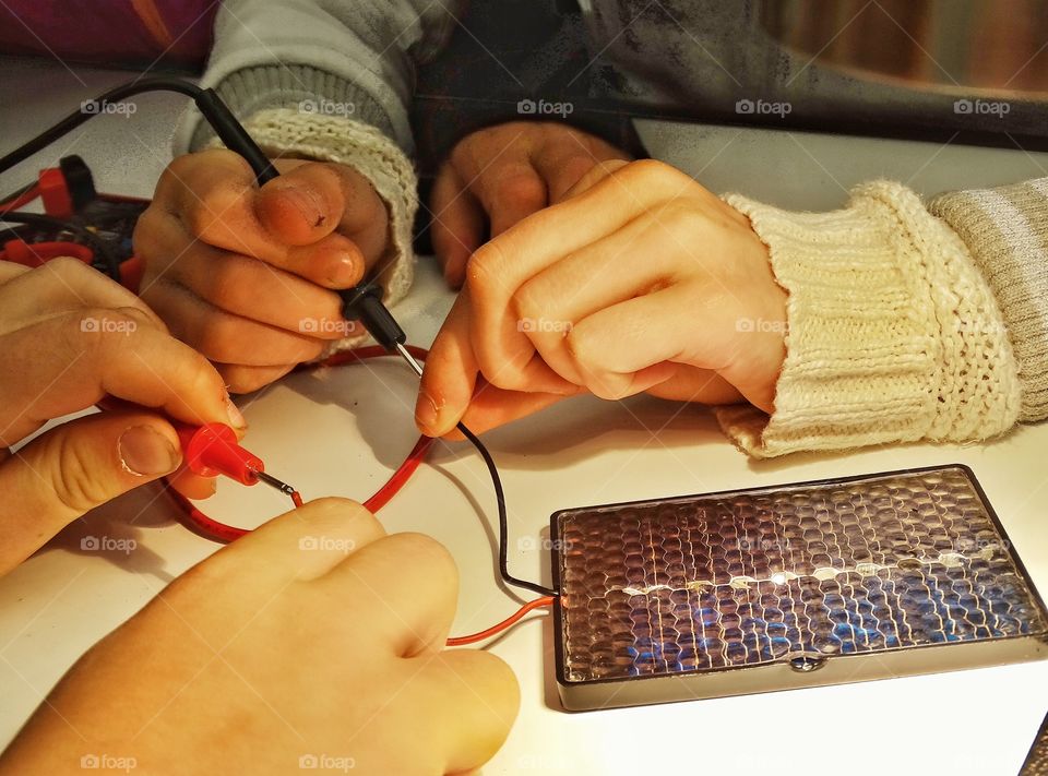 Electrical Engineering. Children Working On An Electrical Science Project
