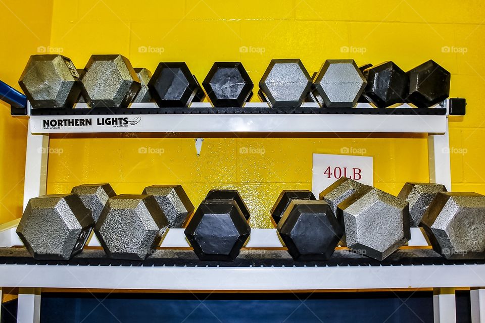 Yellow wall barbells 