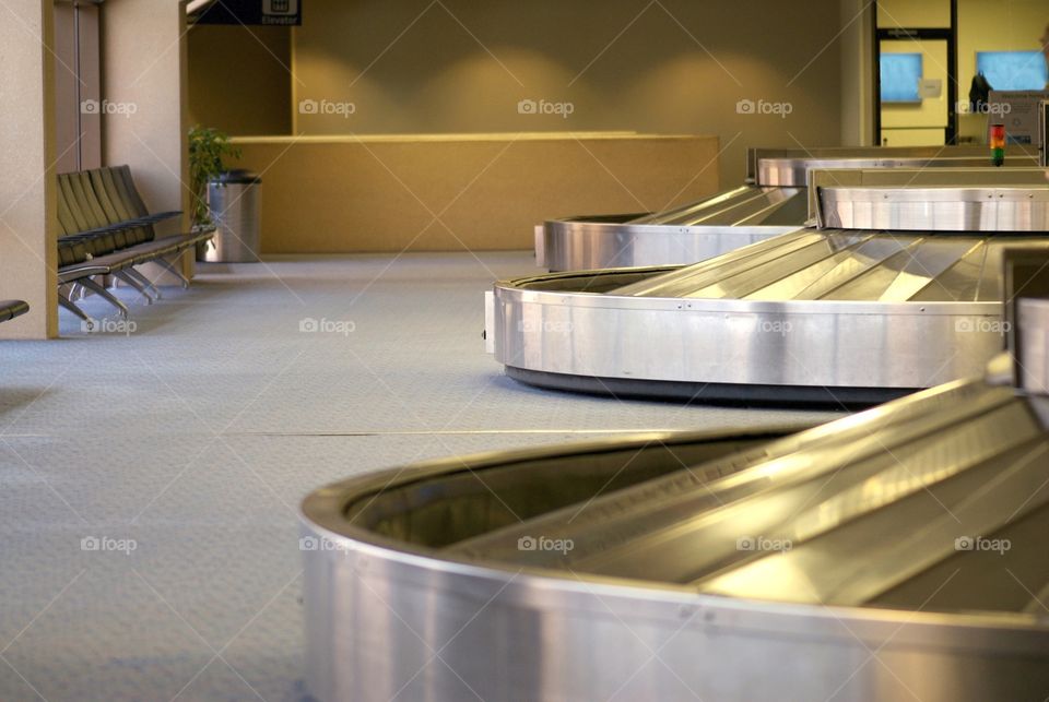 Empty baggage claim area at an airport terminal