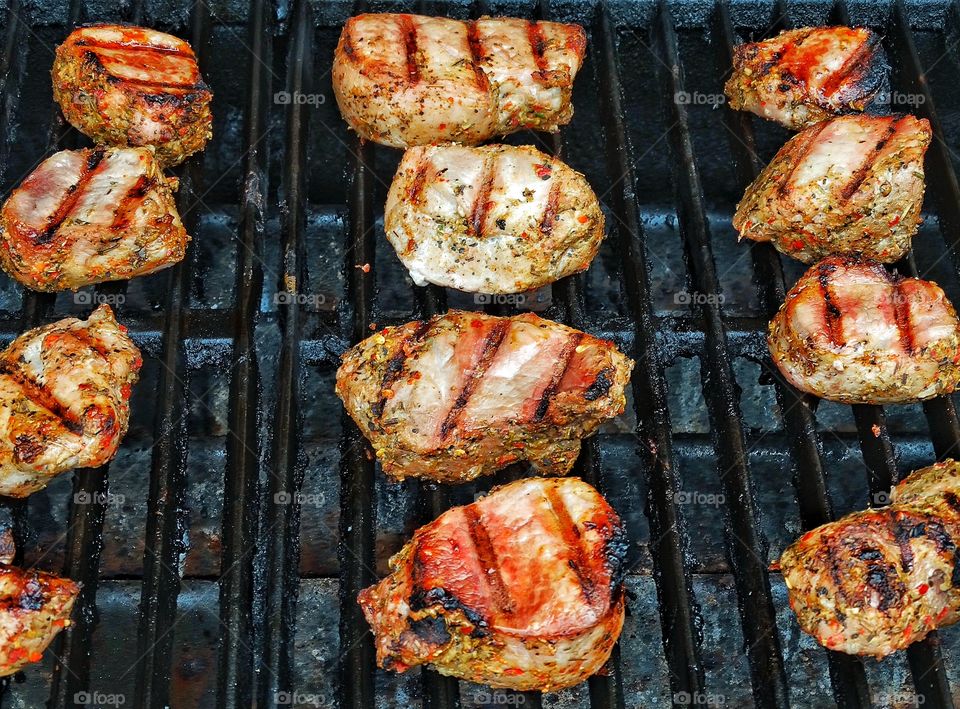 Barbecue. Grilling Pork Chops On A Barbecue
