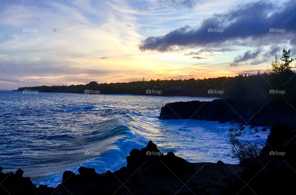 Sunset with a wave